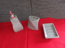 bathroom set soap , tooth brush holders , lotion / soap pump , granite looks
