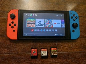 Nintendo Switch with Neon Blue and Neon Red Joy-Con (HAC-001-01)