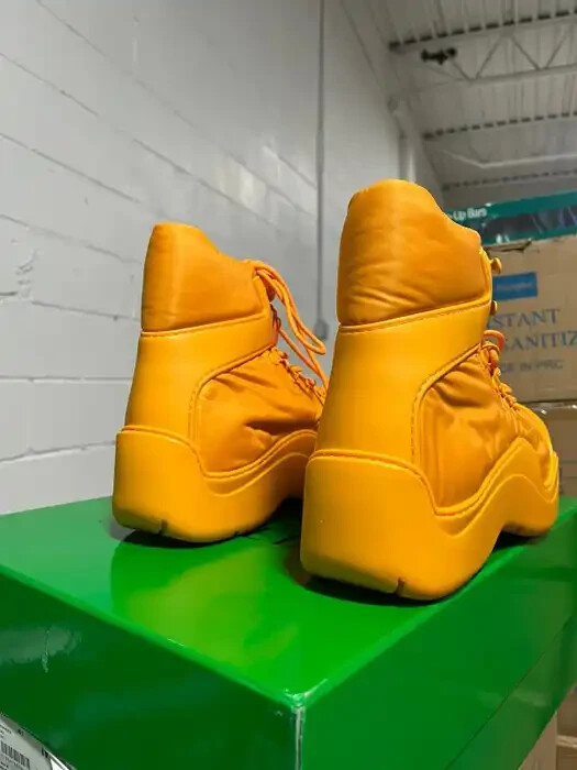 Bottega Veneta
Men\'s Puddle Bomber Boots
Tangerine size 12 Bottega Veneta , Puddle Ankle Boot In Bomber in Tangerine  main image 3