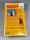 MGM The Wizard Of Oz 1996 VHS cover with ruby slippers, flying monkey, lion, and Wizard Of Oz characters.