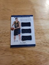 2017-18 Panini National Treasures Rookie Triple Materials #16 TJ Leaf SN 47/99