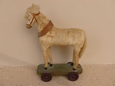 ANTIQUE WOODEN HORSE PULL TOY W ORIGINAL FLOCKING AND WOODEN WHEELS