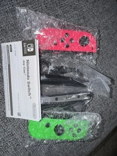 Original Nintendo Switch Green and Red Joy-Con, with wrist straps and Middle pc