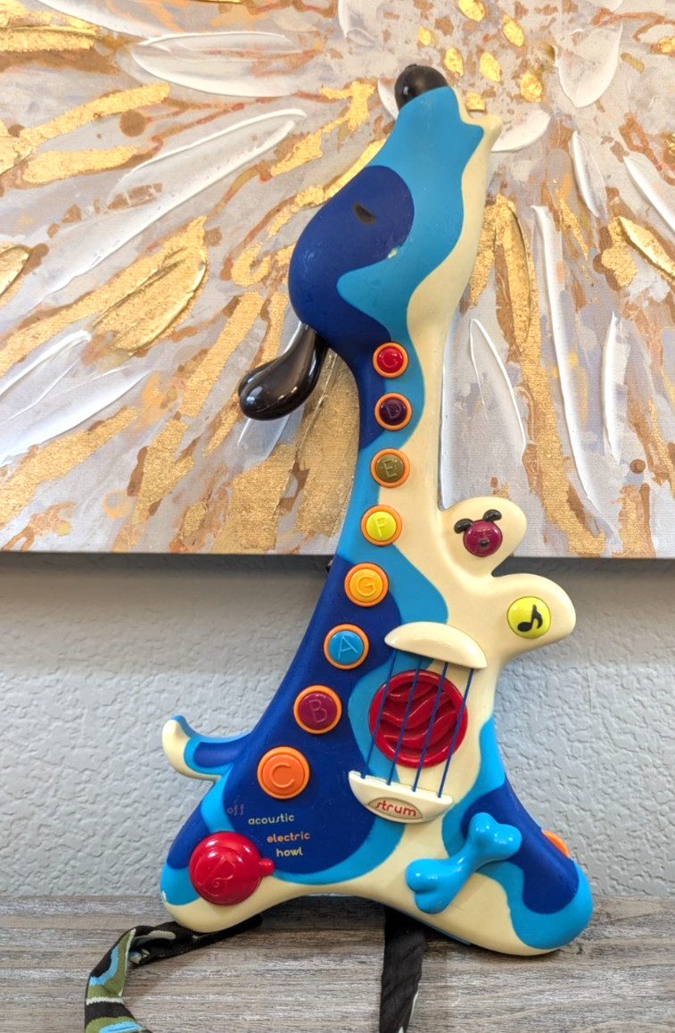 B. Toys Woofer Strum Dog Guitar Musical Toy Electronic Kids 