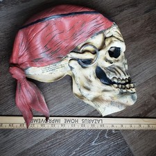 vintage rigid plastic Buccaneer Pirate mask featuring an aged skull