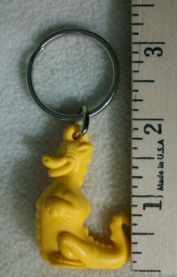 Tupperware Yellow Douglas Dirt Walker Vintage Keychain Key Chain Dragon Dinosaur