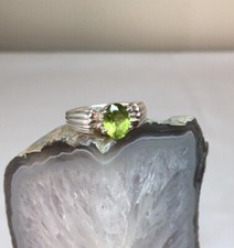Nat.Faceted Peridot, Sterl.Silver Handmade ring. Size 6.75. Stone size - 8 x 6mm