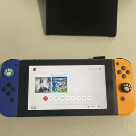 Nintendo Switch HAC-001 bundle with 2 games and carry case plus original charger