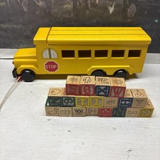 Wooden School Bus With Alphabet, Number, and 19 Blocks Inside