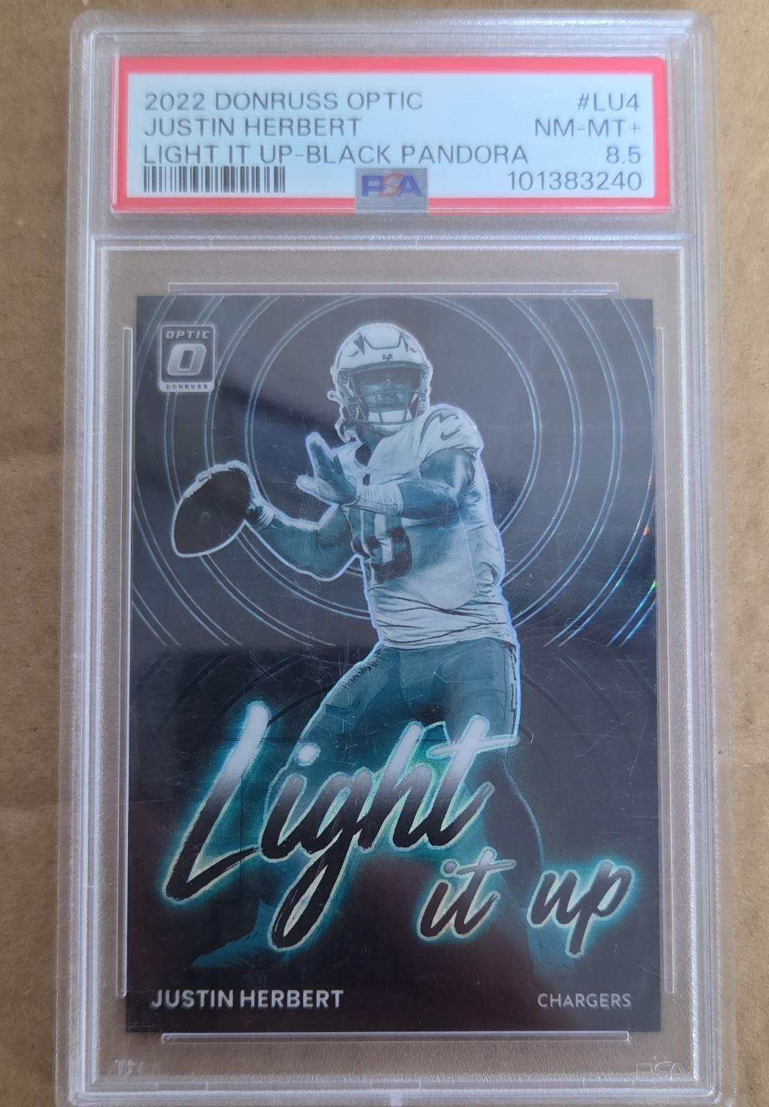 2022 Panini Donruss Optic - Light It Up Justin Herbert Black Pandora Prizm /25