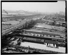 THE TRUSS BRIDGE SEGMENT OF THE TRIBOROUGH BRIDGE IN FOREGROUND AND THE HELL