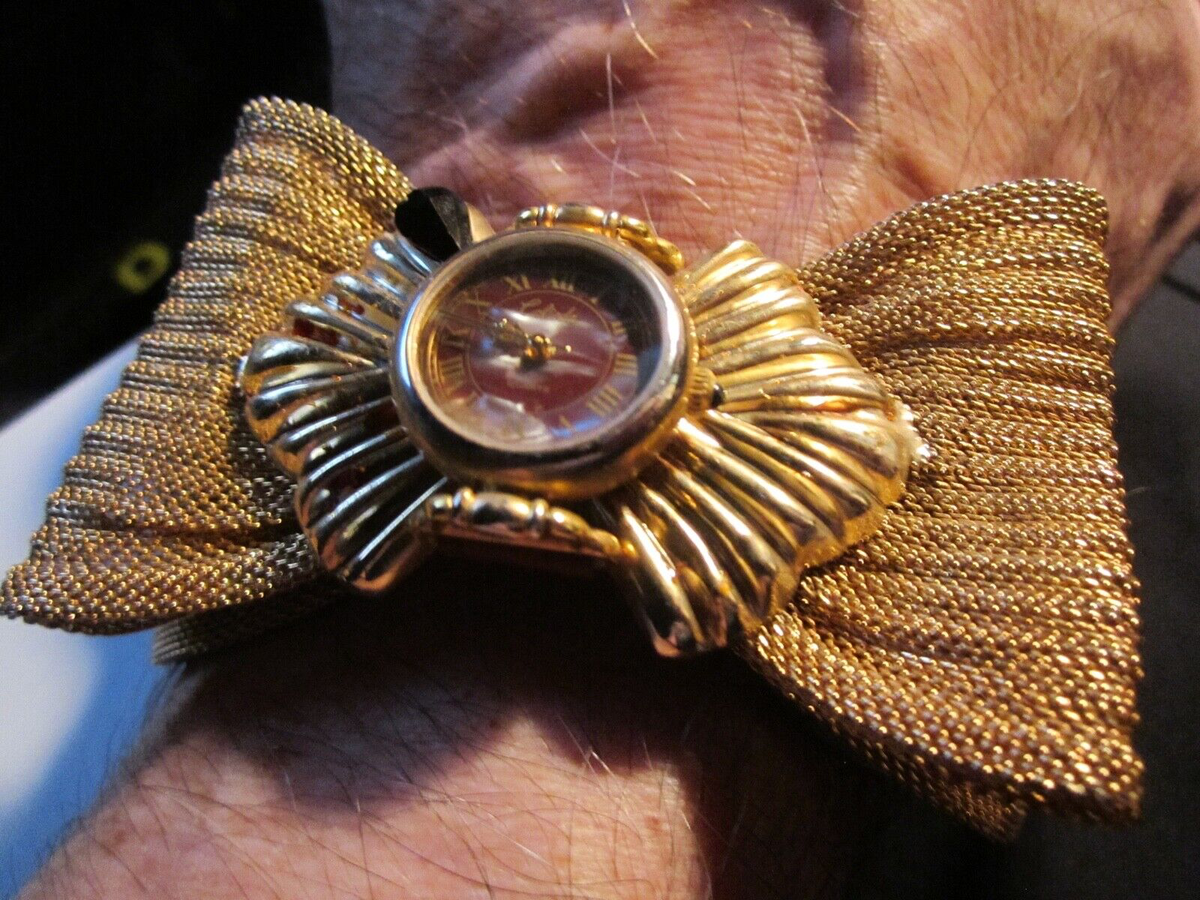 VINTAGE CALINDA WATCH GOLD TONE BOWN TIE DESIGN RED FACE NOT  display picture 3