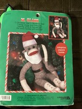Leisure Arts Sock Monkey Kit. M. CLaus With Adoption Papers. NIP. 46265.