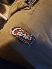 New RAISING CANE'S CHICKEN FINGERS RUBBER KEYCHAIN 2 1/2" 