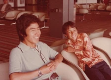 1970s Boys Friends Smiling Portrait Airport Terminal Chairs
