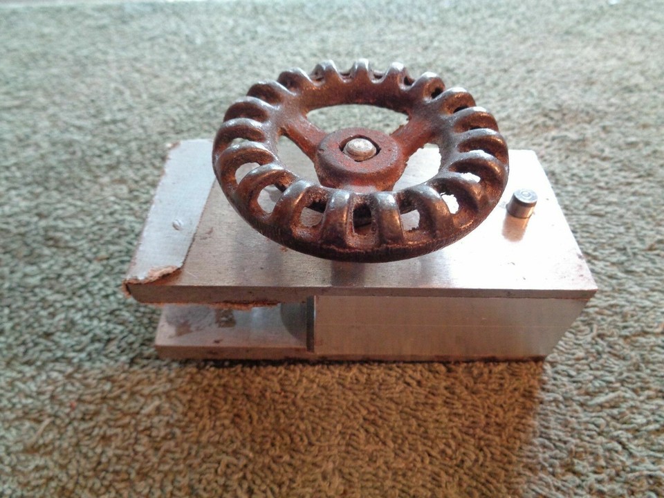 A one-off handmade doweling jig from a real woodworker's shop — the kind of honest, functional folk-craft object that belongs on a maker's workbench.