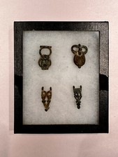 Display of 4 Ancient Roman Bronze Belt Buckles, 1st-2nd Century CE
