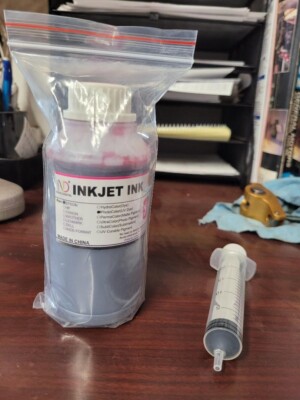 Epson Inkjet refill ink. Bought and never used printer broke right after purchas