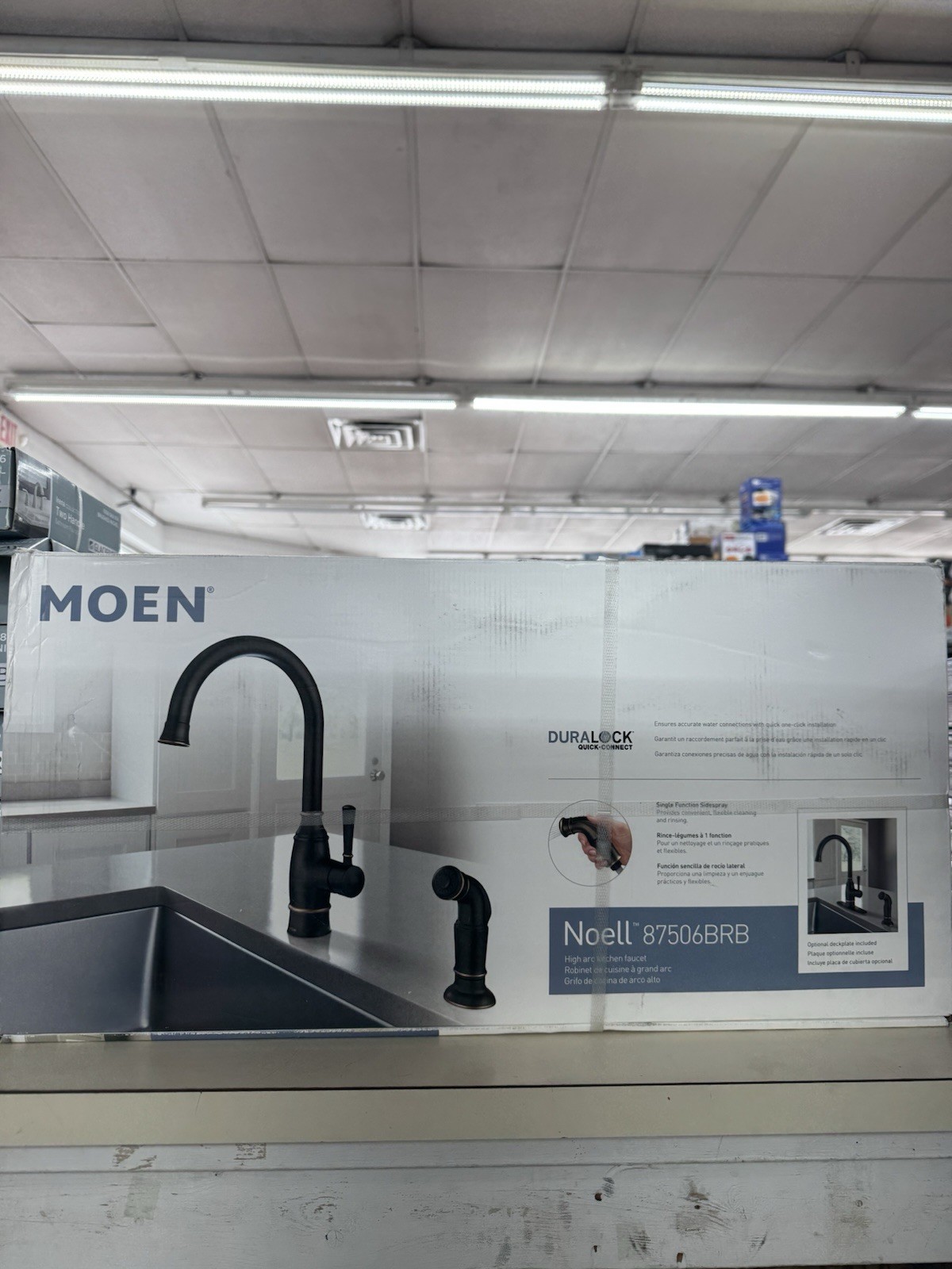 MOEN Noell 87506BRB Single-Handle Standard Kitchen Faucet with Side Sprayer in