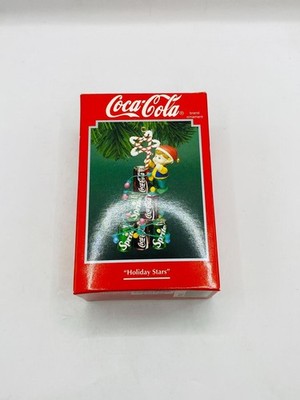 Holiday Stars Enesco Ornament 1994   Elf Climbing Coca-Cola & Sprite Tree