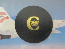 BRITISH AIRWAYS CONCORDE LEATHER COASTER WITH CROWN IN "C" FROM 1976 A RARE ITEM