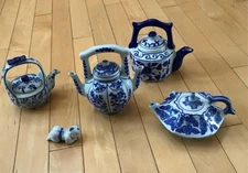 Lot of 5 Blue & White Chinoiserie Porcelain Teapots + Baby Figurine