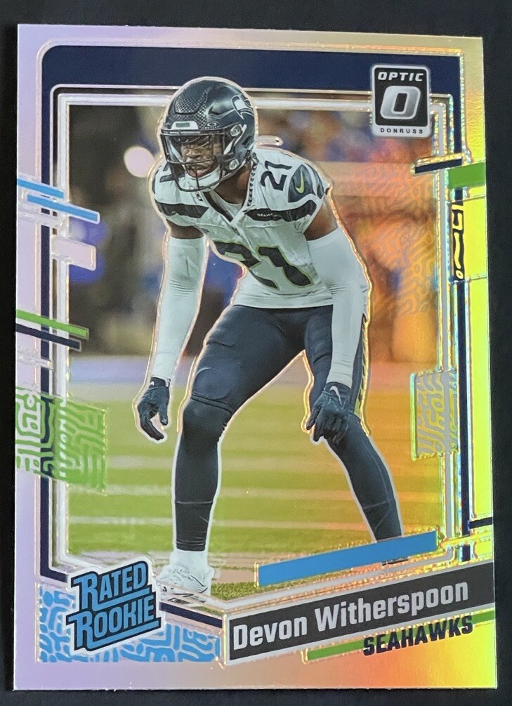 2023 Donruss Optic Devon Witherspoon Rated Rookie Holo Prizm #292 Seahawks