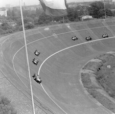 Tony Brooks Ferrari 246 leads Stirling Moss Cooper T51 Climax Mast- 1959 Photo