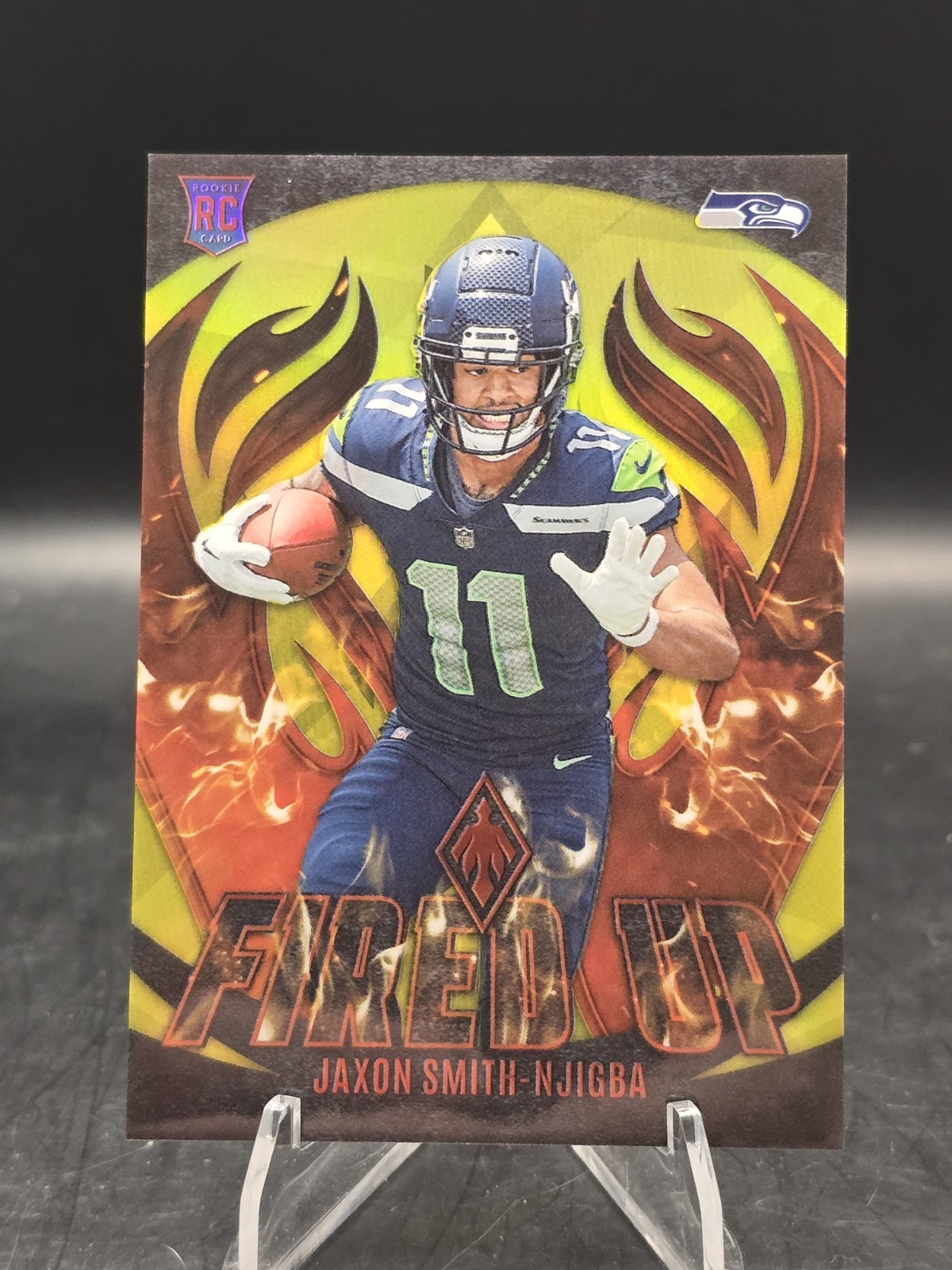2023 Panini Phoenix Jaxon Smith-Njigba Fired Up Yellow /50 (RC) #FU-12 Seahawks