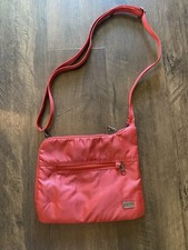 Pacsafe Daysafe Anti Theft Slim Crossbody Bag...