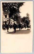 Vtg B&W Snapshot Men In Uniforms Marching In Parade On Cobblestone Street 1920s