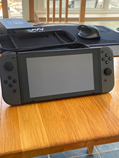 Nintendo Switch Console with Joy-Con, Dock, Carry Case, Joy Con Controller Grip