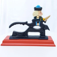 Vintage 1979 King Nutcracker, Cast Iron on Red Wood Base
