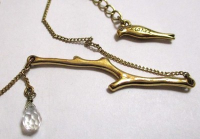CHLOE & ISABEL GOLDTONE NECKLACE BRANCH & CRYSTAL RAINDROP, BIRD CHARM TAG