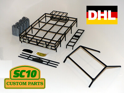 23005 Camel Trophy Dachgepäckträger + Rollcage + 4 Kanister f. 1/10 RC4WD LR D90