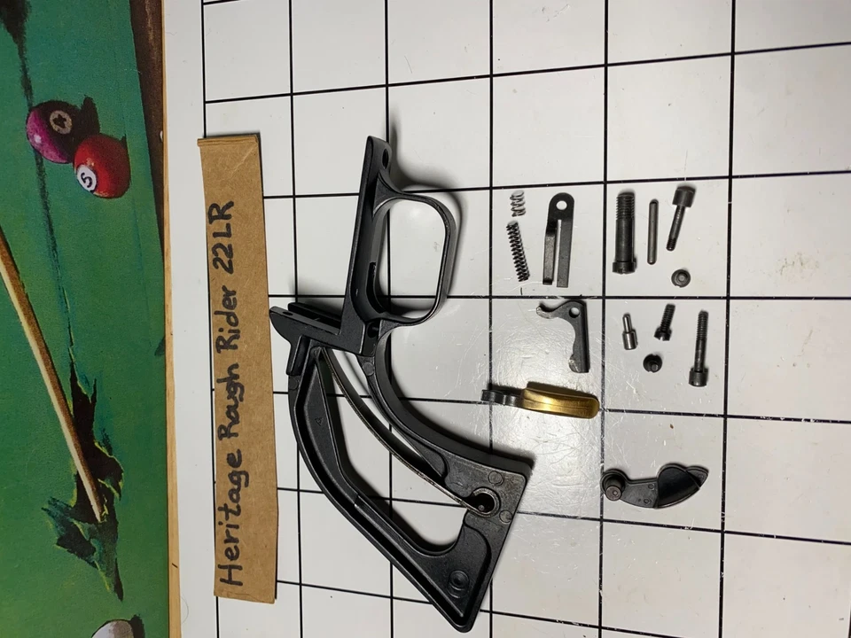 Heritage Rough Rider .22 LR.Back strap . Gold-plated trigger.& more repair parts - Image 3 of 4