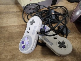 Nintendo  Console And Remotes  (N64, NES, SNES) lot of 10