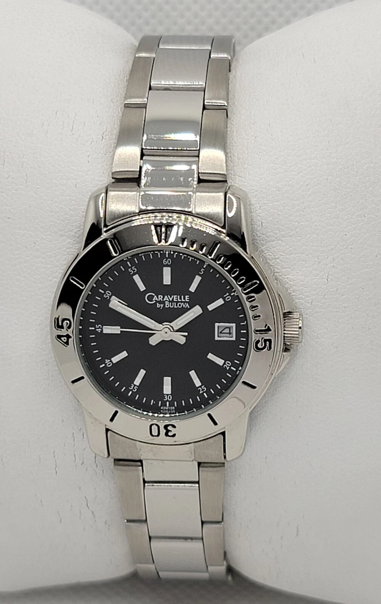 Ladies Caravelle by Bulova Round Silver Tone Black Dial Date Watch