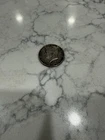 1964 Kennedy Half Dollar Reverse Has A Black Tone