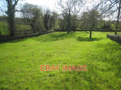 PHOTO  FAMINE GRAVEYARD DRUMSHANBO A PLAQUE IN THE WALL RECORDS HERE THE POOR OF