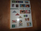 stock book 4 double pages  white with stamp pictures