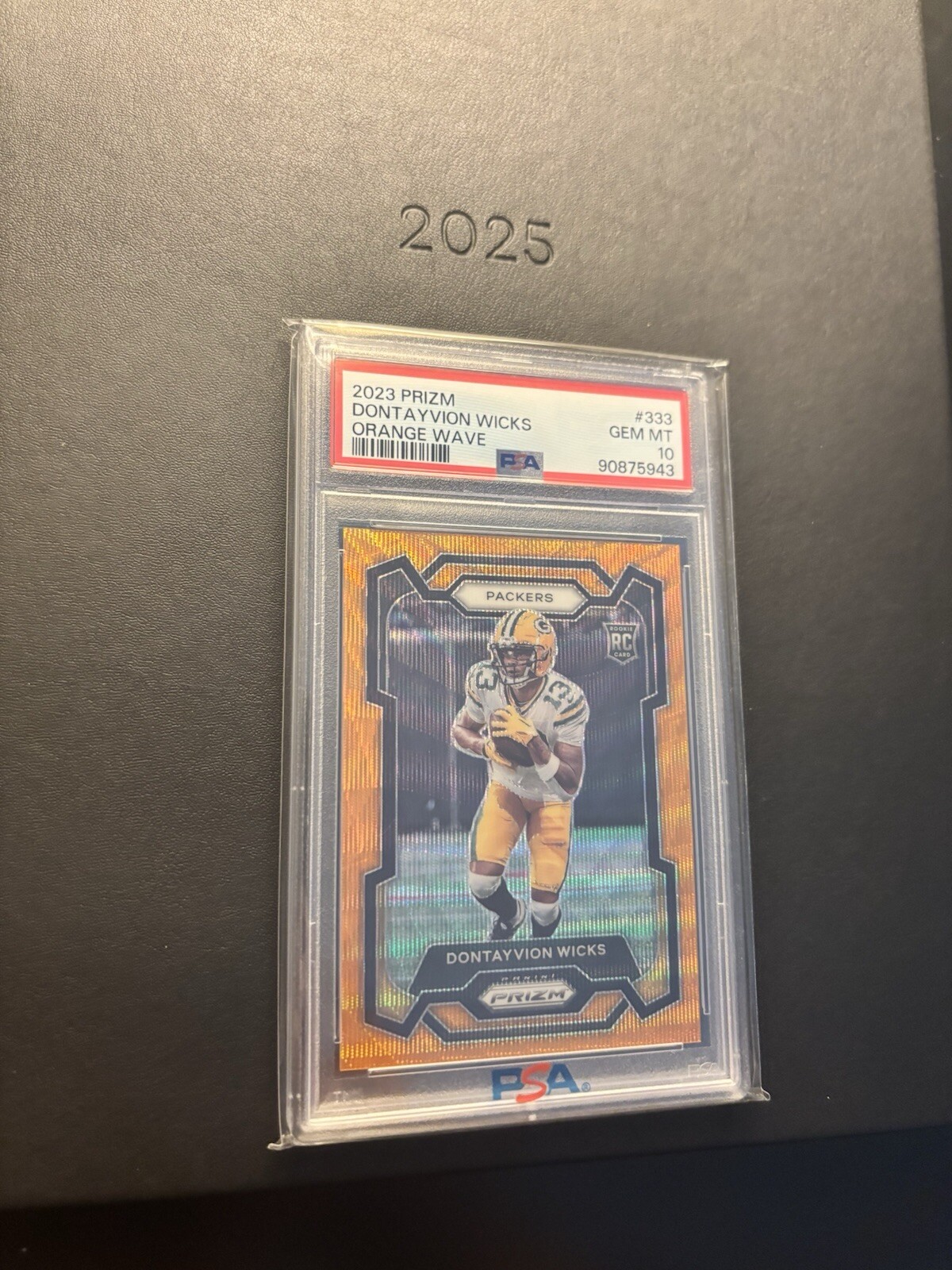 2023 Panini Prizm - Rookies Orange Wave Prizm #333 Dontayvion Wicks /60 (RC)