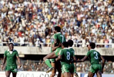 Nigeria Segun Odegbami celebrates one of his two goals with his te- Old Photo