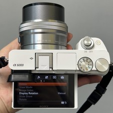 Sony Alpha a6000 24.3MP Mirrorless Digital Camera w/16-50mm OSS Lens English