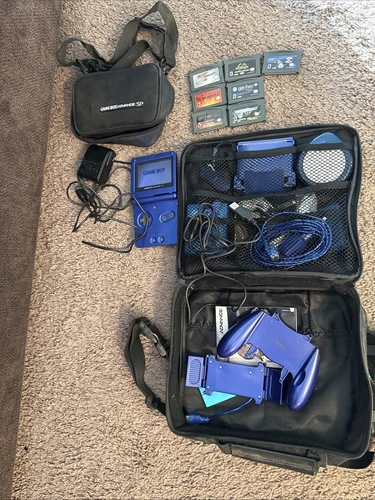 Gameboy Advance SP Blue, 7 Games, 2 Batteries, 2 Cases, Many Accessories