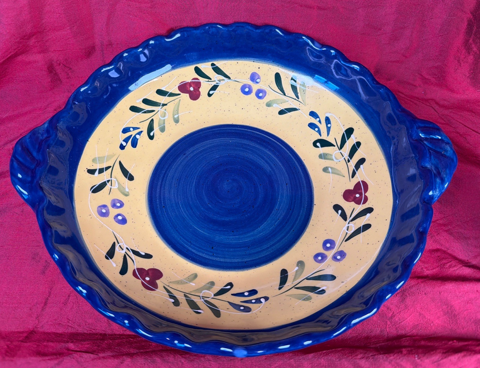 ceramic serving bowl is part of the Baum Brothers Blue Floral Collection