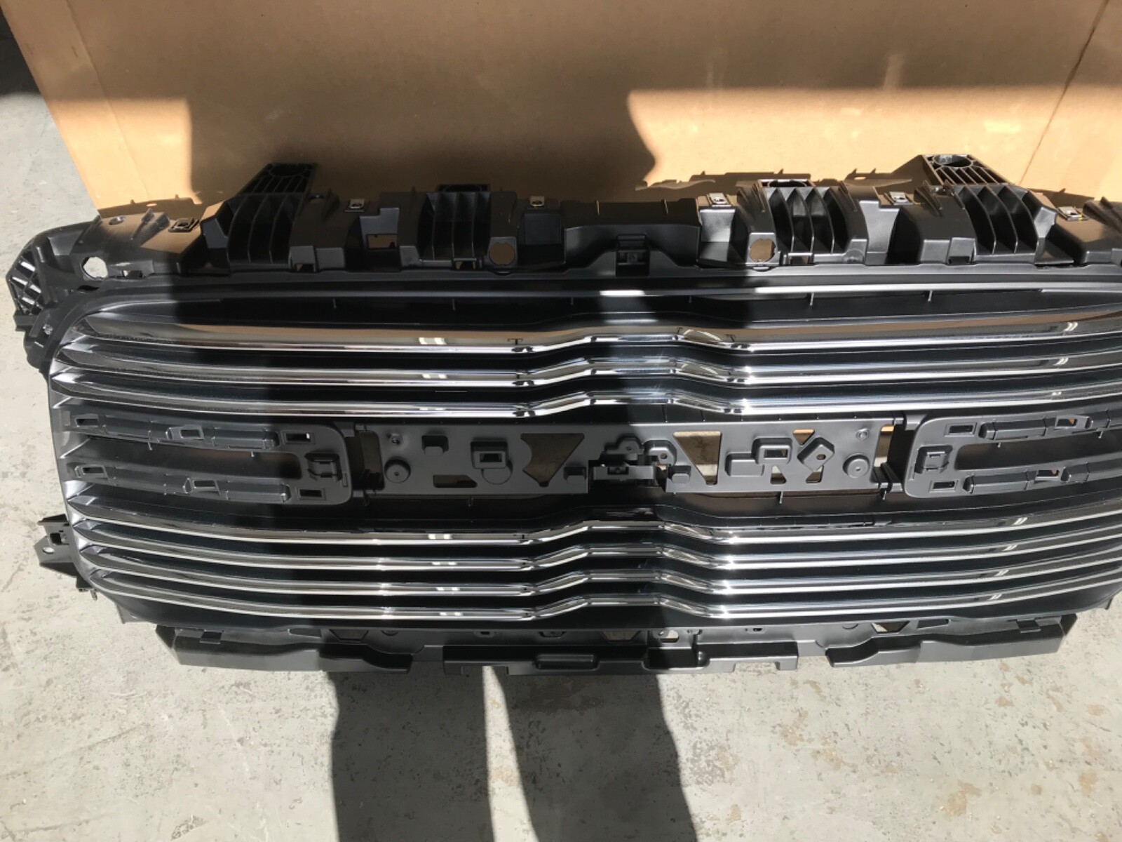 2019-2020 Dodge Ram Chrome Grille Nameplate - OEM Mopar Replacement, Part #68311411AA 11 thumbnail image