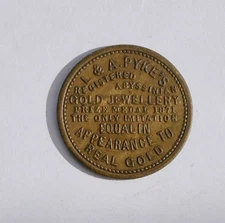 "L & A PYKE'S REISTERED ABYSSINIAN GOLD JEWELLERY" ADVERTISING TOKEN (LONDON)