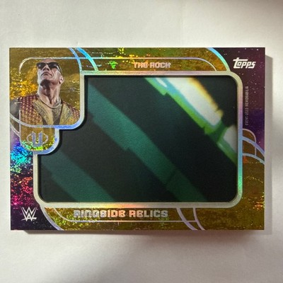 2025 Topps WWE Universe THE ROCK Ringside Relics Gold Stone 19/50 