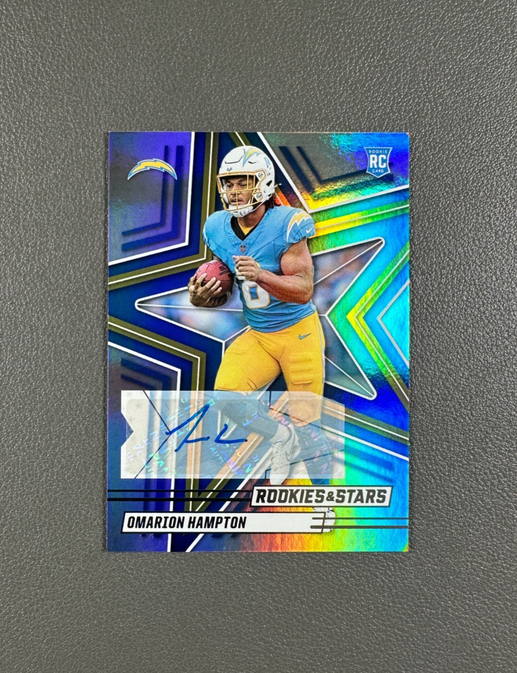 2025 Panini Rookies & Stars Omarion Hampton Rookie Holo Auto RC #166